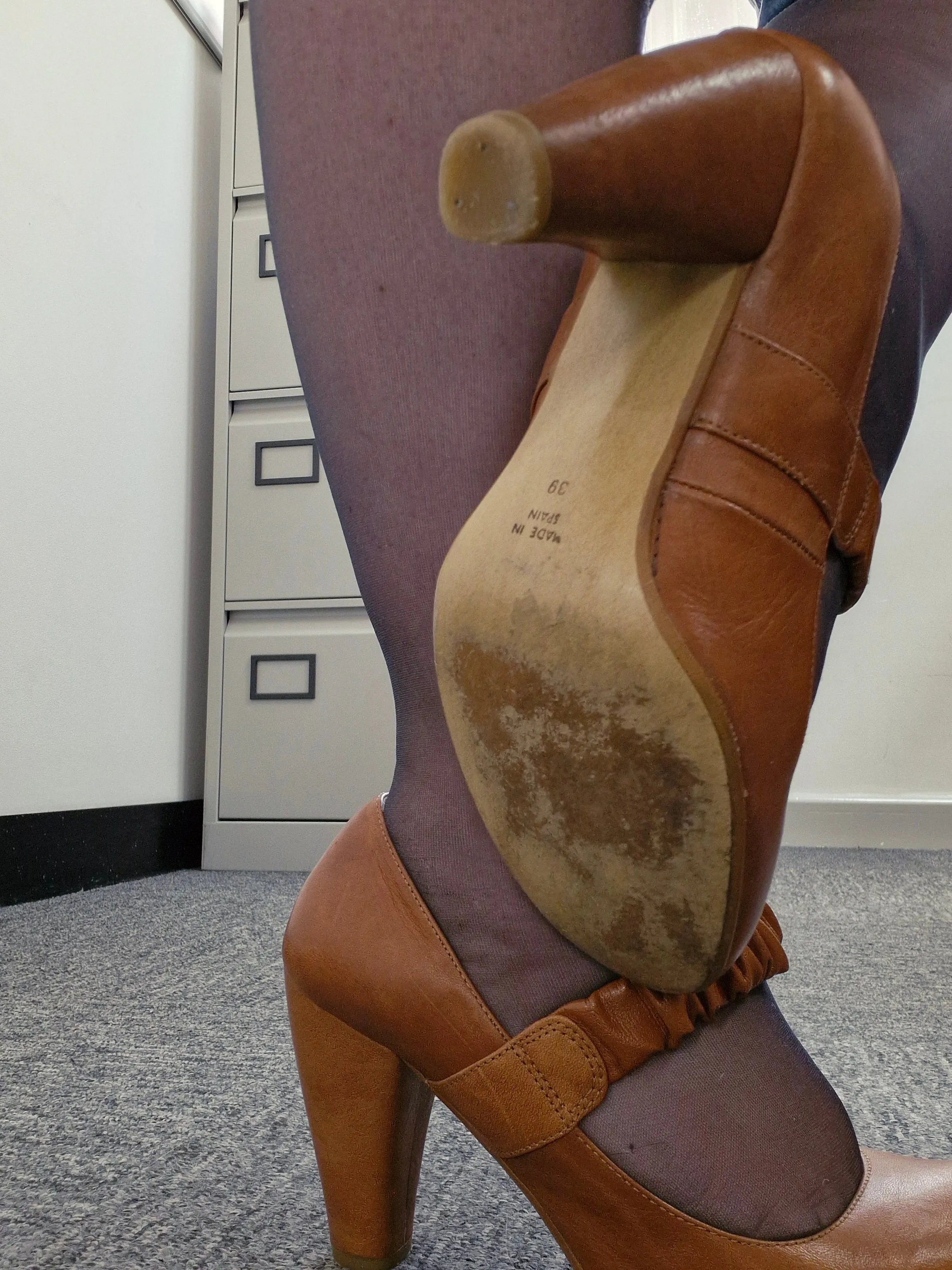 Brown, leather well-worn Nary Jane style heels