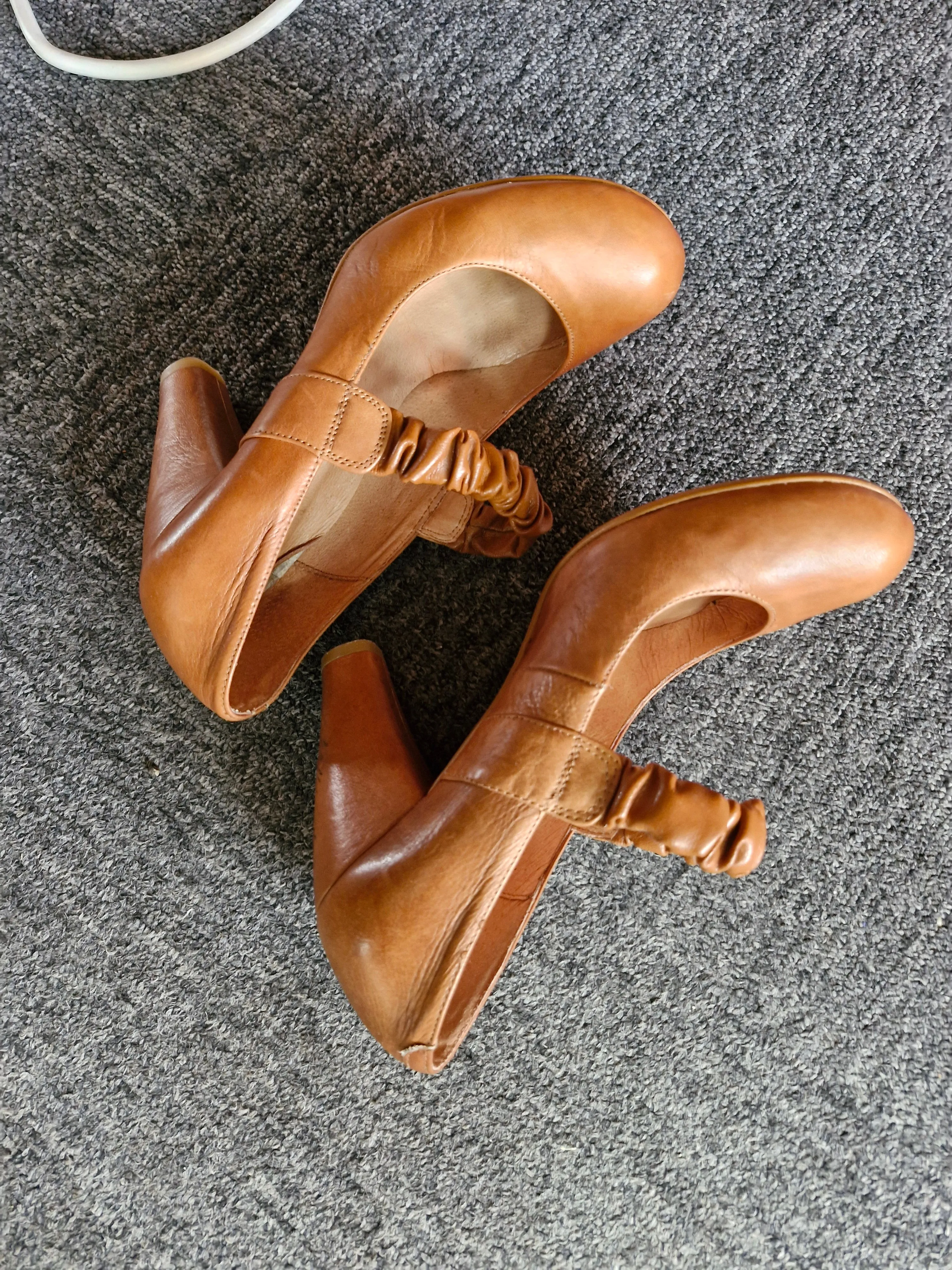 Brown, leather well-worn Nary Jane style heels